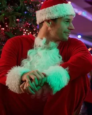 Connor Swindells Jingle Bell Heist Nick Christmas Red Santa Coat 300x375 1.jpeg